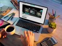 Mid,section,of,teacher,having,a,video,conference,with,multiple